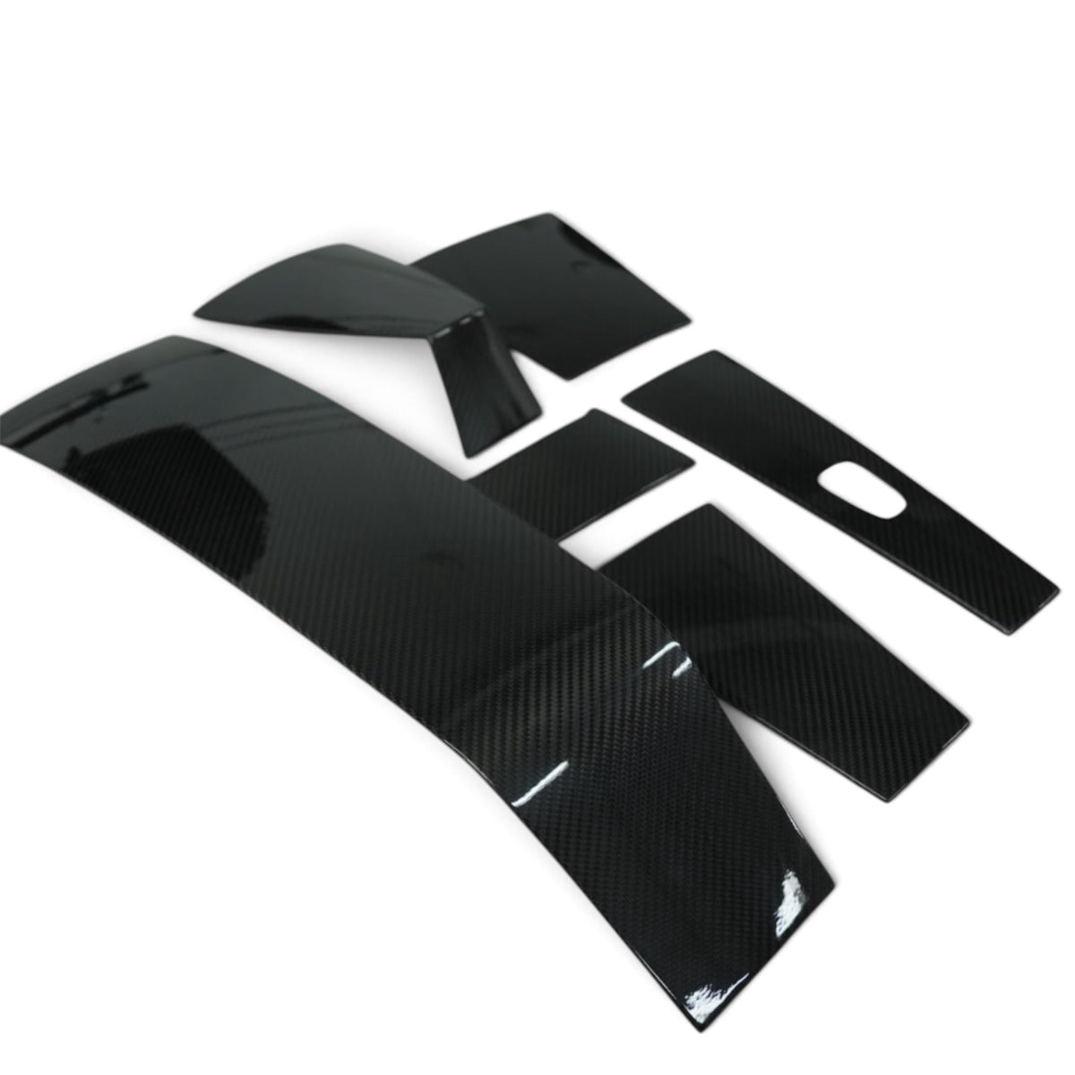 Mercury Racing carbon cowling trim set, close-up angled view showing curved covers and carbon fiber weave